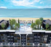 Apartment construction in Pattaya with a beach view, rooftop garden, and pool.