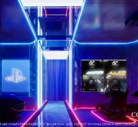 A gaming room with ambient lighting, gaming consoles, and relaxation seats in an apartment building under construction.