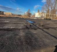 A rooftop view of buildings from garages in Bratislava - Ružinov on Prístavná Street in winter.