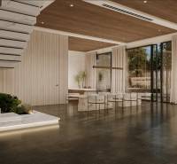 The interior of a family house with a connection to the outdoor space through large glass doors.