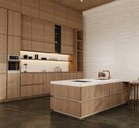 Elegant kitchen with wooden cabinets and an island in a family house.