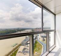 View of the river and the panorama of Bratislava from the balcony of a 4-room apartment.