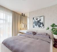 Bedroom of a 3-room apartment with a bed, painting, plant, and large window.