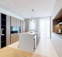 A kitchen in a 3-room apartment with an island, built-in appliances, and a large window.