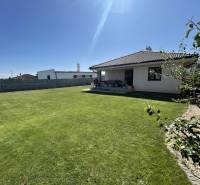 A family house in Prešov with a landscaped garden, lawn, and terrace.