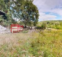 A cottage surrounded by greenery and trees on plots - living in Pezinok.