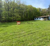Greenery and building near the forest in Pezinok for residential land.