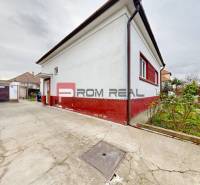 Family house on Farebná Street in Bratislava II with a concrete walkway and fencing.