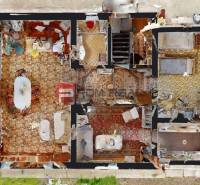 A view of the layout of the family house rooms, including the living room, bedroom, and kitchen.