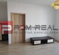 The interior of a simple 2-room apartment on Slavomírova Street with modern furnishings.