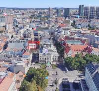 Aerial view of the center of Bratislava, Gorkého Street with buildings and greenery.