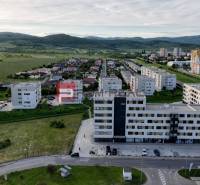 Commercial premises on Obchodná Street in Pezinok, surrounded by greenery and residential areas.