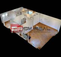 Interior of a family house with a layout of rooms and wooden flooring.