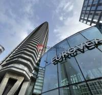 High-rise building and glass facade of commercial premises on Pribinova Street, Bratislava II.