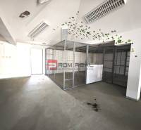 Interior on Ľ. Podjavorinská Street with grilled spaces; the building is bright and functional.