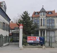 Building on Ľ. Podjavorinská Street in an exhibition style with the sign 