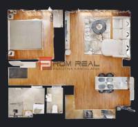 Floor plan of a 2-room apartment with a living room, bedroom, kitchen, and bathroom.