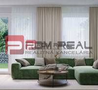 The living room in the three-room apartment has a green sofa and a wooden table, Limbašská cesta.