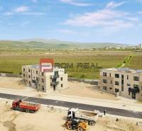 On Limbašská Road, there are new buildings surrounded by vineyards near two 2-room apartments.