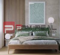 Bright bedroom in a 2-room apartment, Limbašská cesta, with modern bed design and decorations.