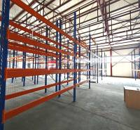 Shelves in the interior of warehouses and halls with window lighting and concrete flooring.