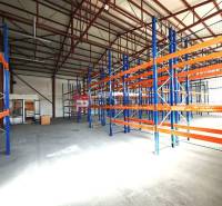 A space with storage racks inside a hall in Modra on Šúrska.