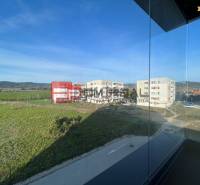 View from a 4-room apartment on Obchodná Street in Pezinok of the surroundings and buildings.