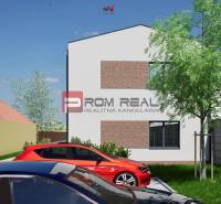 Two-story building with cars and trees on Hlavná Street in Viničné, Plots - residential.