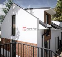 White facade and red brick details of the building on Holubyho Street in Pezinok suitable for Residential Land.