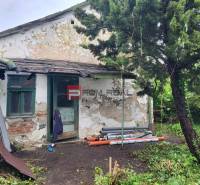 An older house on Holubyho Street in Pezinok, suitable for residential land.
