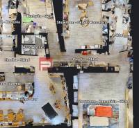 Floor plan of commercial spaces with kitchen, bistro, storage rooms, and showroom.