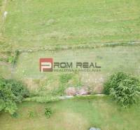 Aerial view of residential plots in Marianka, Na Tálkoch, surrounded by greenery.