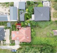 Aerial view of plots - housing in Marianka on Na Tálkoch street, with gardens and buildings.