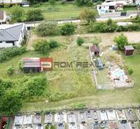 Building plot in Marianka on Na Tálkoch street, green areas and garden structures.