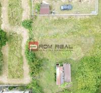 Aerial view of an unmaintained residential plot in Marianka on Na Tálkoch Street.