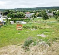 Marianka, Na Ovsisku: Land - housing with a view of the surrounding houses and greenery.