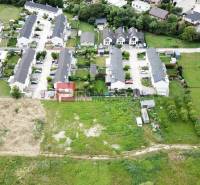 Aerial view of a residential area and plots - housing in Marianka on Na Ovsisku.