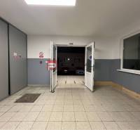 Entrance hallway inside warehouses and halls with exit to the parking lot.