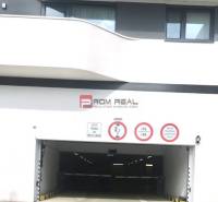 Entrance to the garages on Údernícka Street in Bratislava V, with prohibition signs.