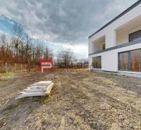 A family house in Dunajská Streda with a large plot and partially landscaped terrain.