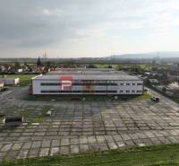 Production premises on Pezinská Street in Vinosady surrounded by green areas and roads.