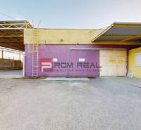 Purple building and yellow container on Závodná Street in Bratislava II, Warehouses and Halls.