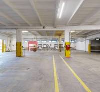 Warehouses and halls with spacious interiors and distinctive yellow elements.