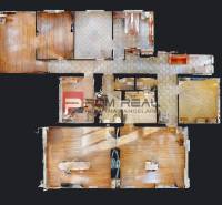 Floor plan of the office with furniture, separate spaces, and wooden flooring.