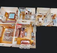 3D floor plan of a family house with a living room, bedrooms, and a kitchen.