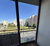View from a one-room apartment on General Klapka Street in Komárno with panel buildings.