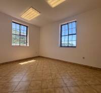 Interior of warehouses and halls with windows and ceramic tiles on the floor.