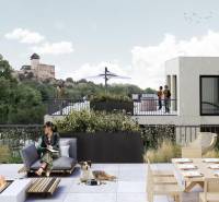 Rooftop terrace with a view of the castle in Trenčín; construction of apartments on M.R. Štefánik Street.