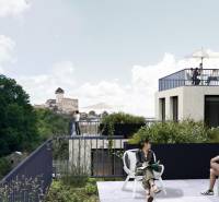Apartment construction on M.R. Štefánika in Trenčín with a view of the castle and greenery.