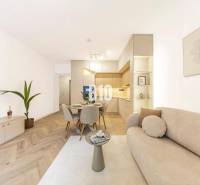 A bright interior of a 3-room apartment with a kitchen, dining room, and decorations on Benediktiho Street.